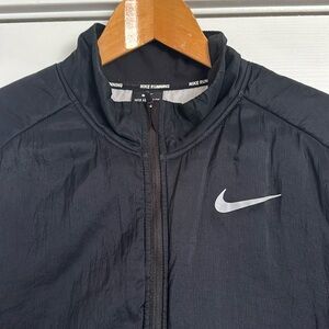 Lightly worn black lightweight bomber Nike jacket.